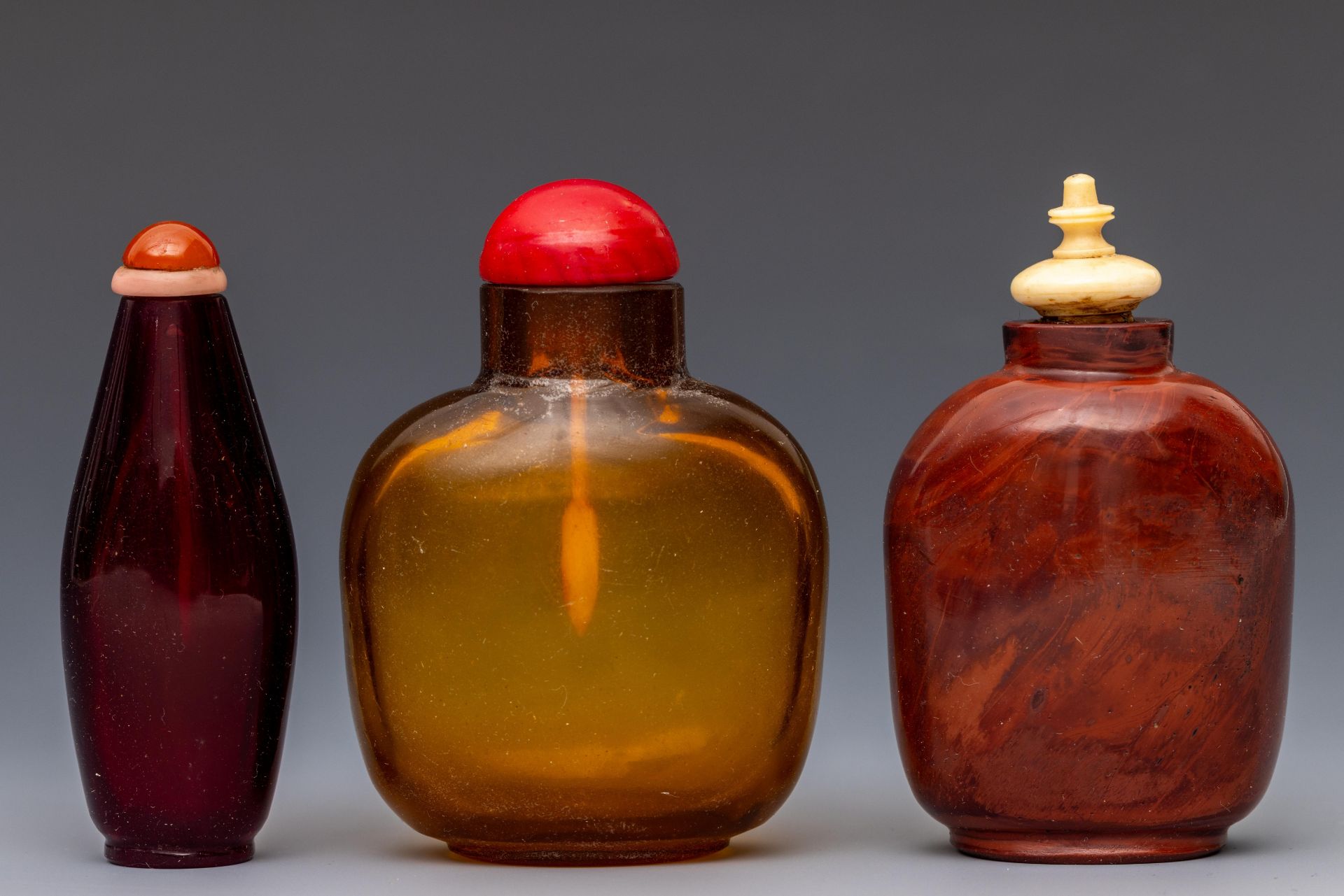 China, three glass snuff bottles and stoppers, late Qing dynasty (1644-1912), - Image 2 of 2