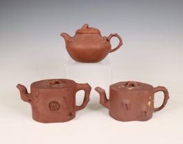 China, three Yixing teapots and covers, 19th/ 20th century,