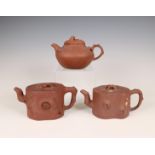 China, three Yixing teapots and covers, 19th/ 20th century,