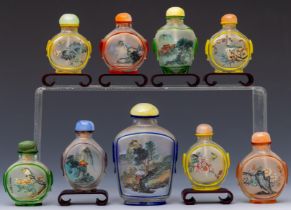 China, collection of reverse glass painted snuff bottles and stoppers, 20th century,