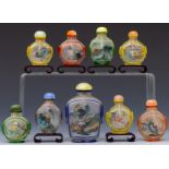 China, collection of reverse glass painted snuff bottles and stoppers, 20th century,