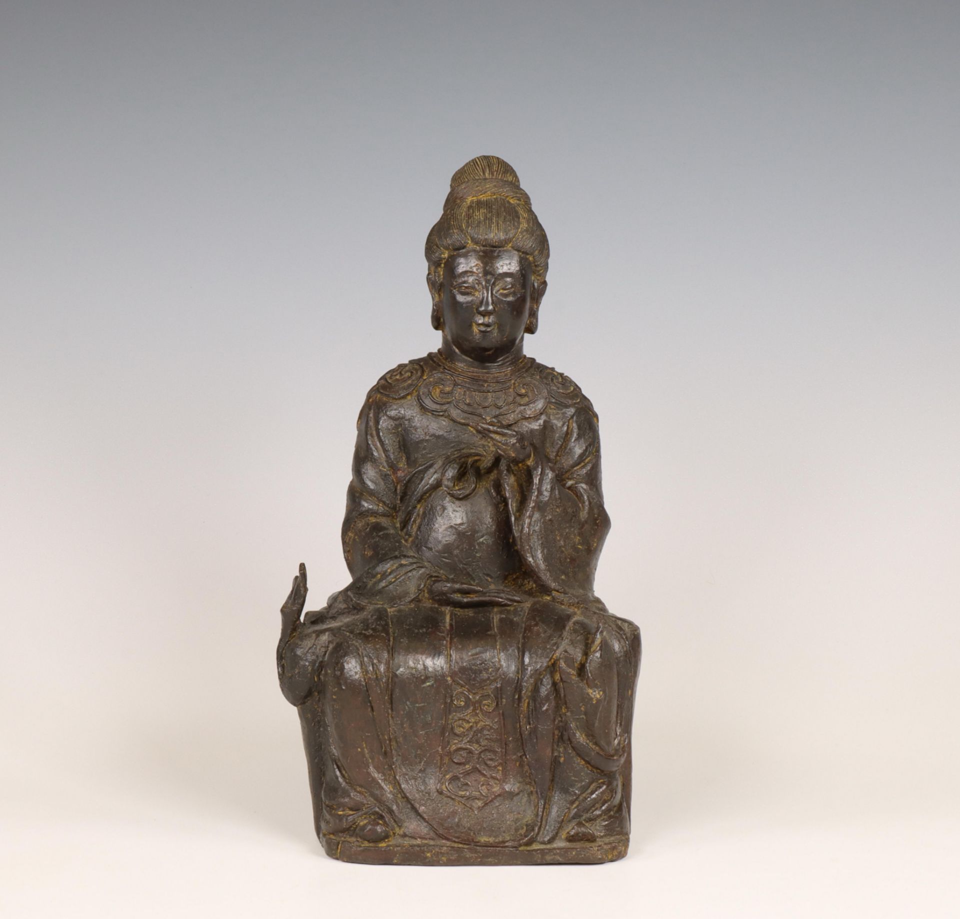 China, a bronze figure of a seated lady, Yuan-Ming dynasty, ca. 14th century,