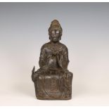 China, a bronze figure of a seated lady, Yuan-Ming dynasty, ca. 14th century,