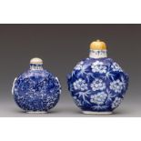 China, two large blue and white porcelain snuff bottles and stoppers, 20th century,