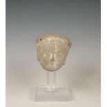 China, a grey pottery head, possibly Tang dynasty (618-907),
