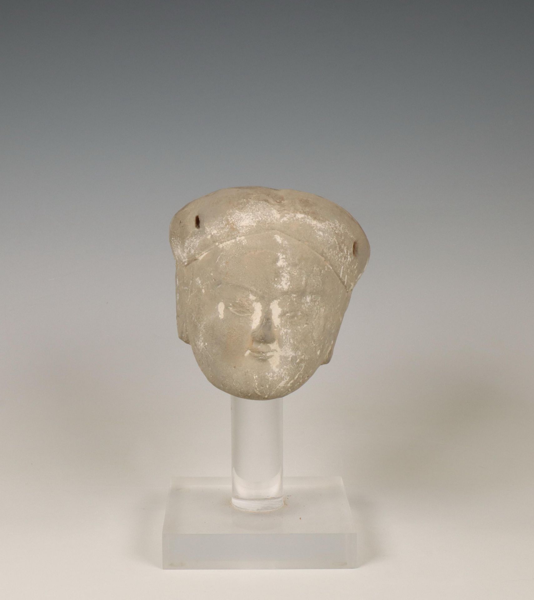 China, a grey pottery head, possibly Tang dynasty (618-907),