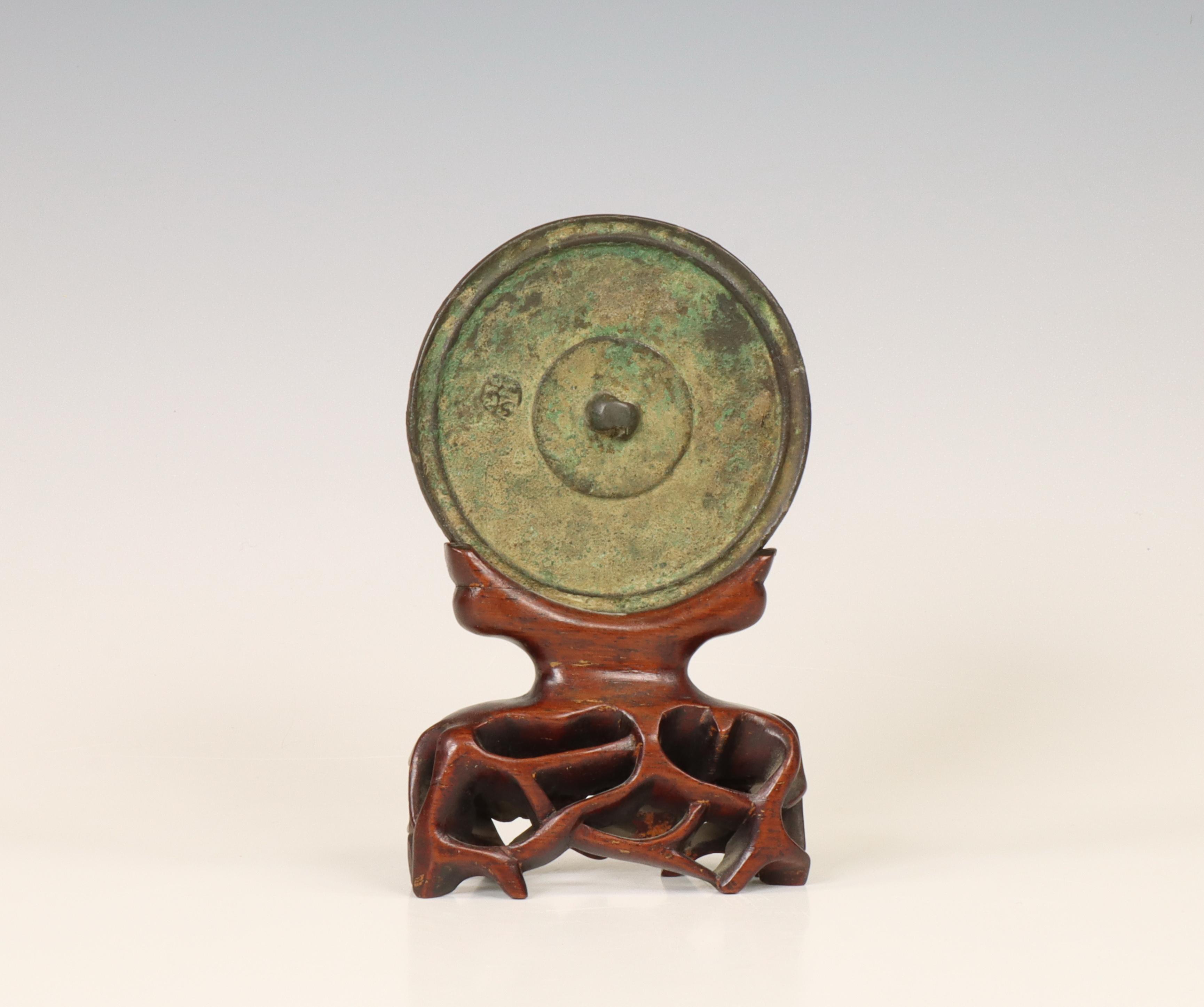 China, a bronze circular mirror, possibly Tang dynasty (618-907),