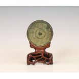 China, a bronze circular mirror, possibly Tang dynasty (618-907),
