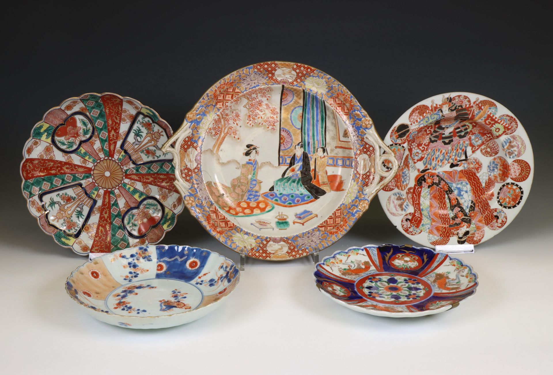 Japan, a collection of Imari porcelain plates and a tazza, 19th century,