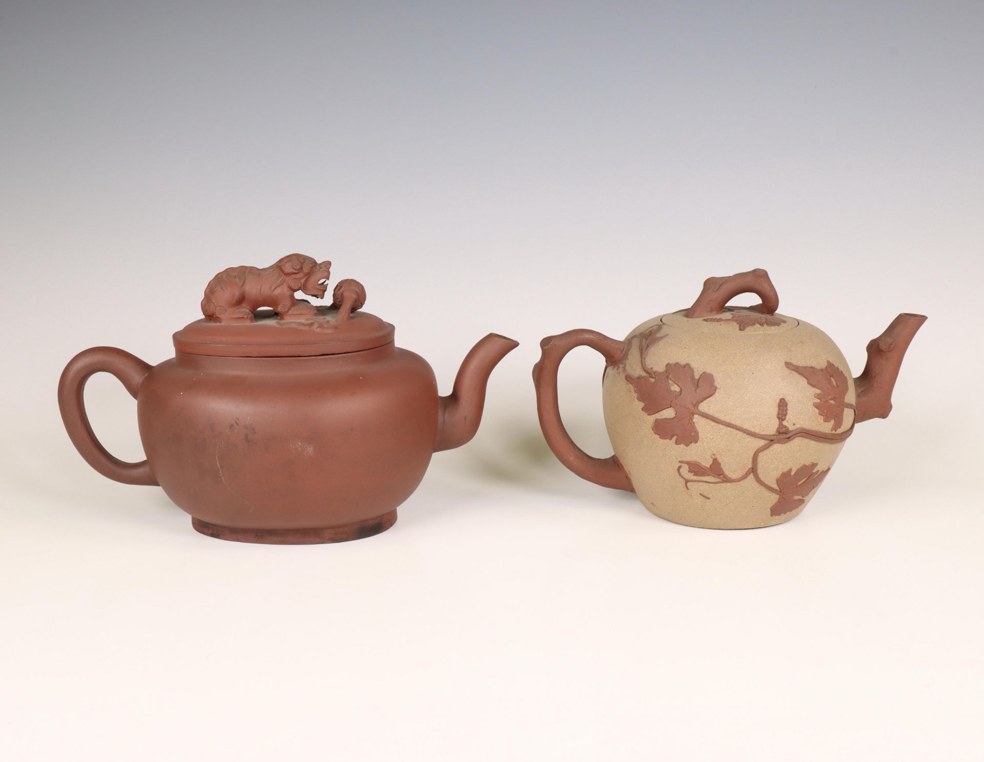 China, two Yixing earthenware teapots and covers, 19th/ 20th century,