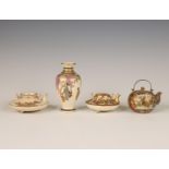 Japan, three Satsuma porcelain teapots and a small vase, 19th century,