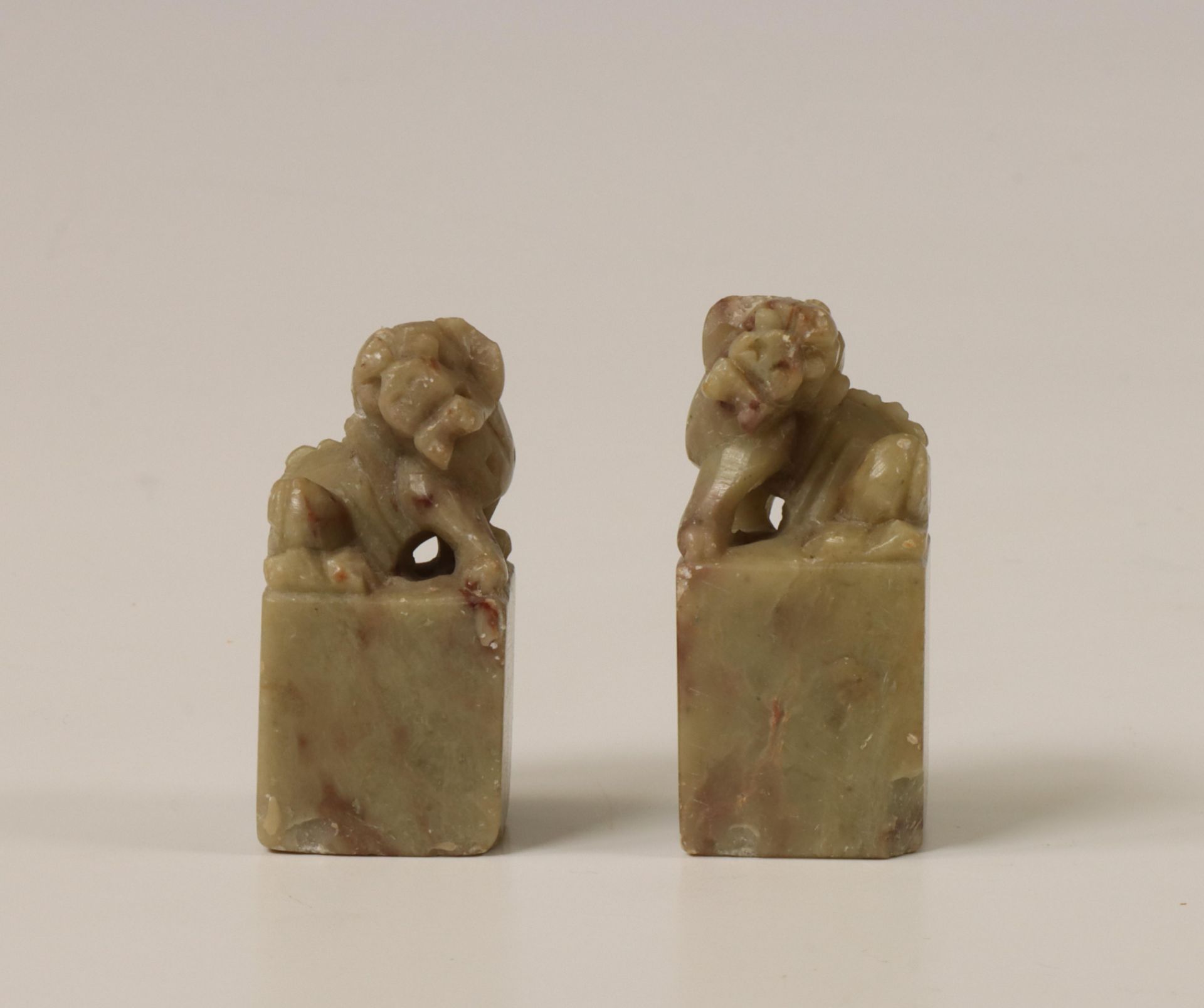 China, two soapstone seals with buddhist lion finials, late 19th century,