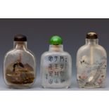 China, three reverse glass painted snuff bottles and stoppers, 20th century,