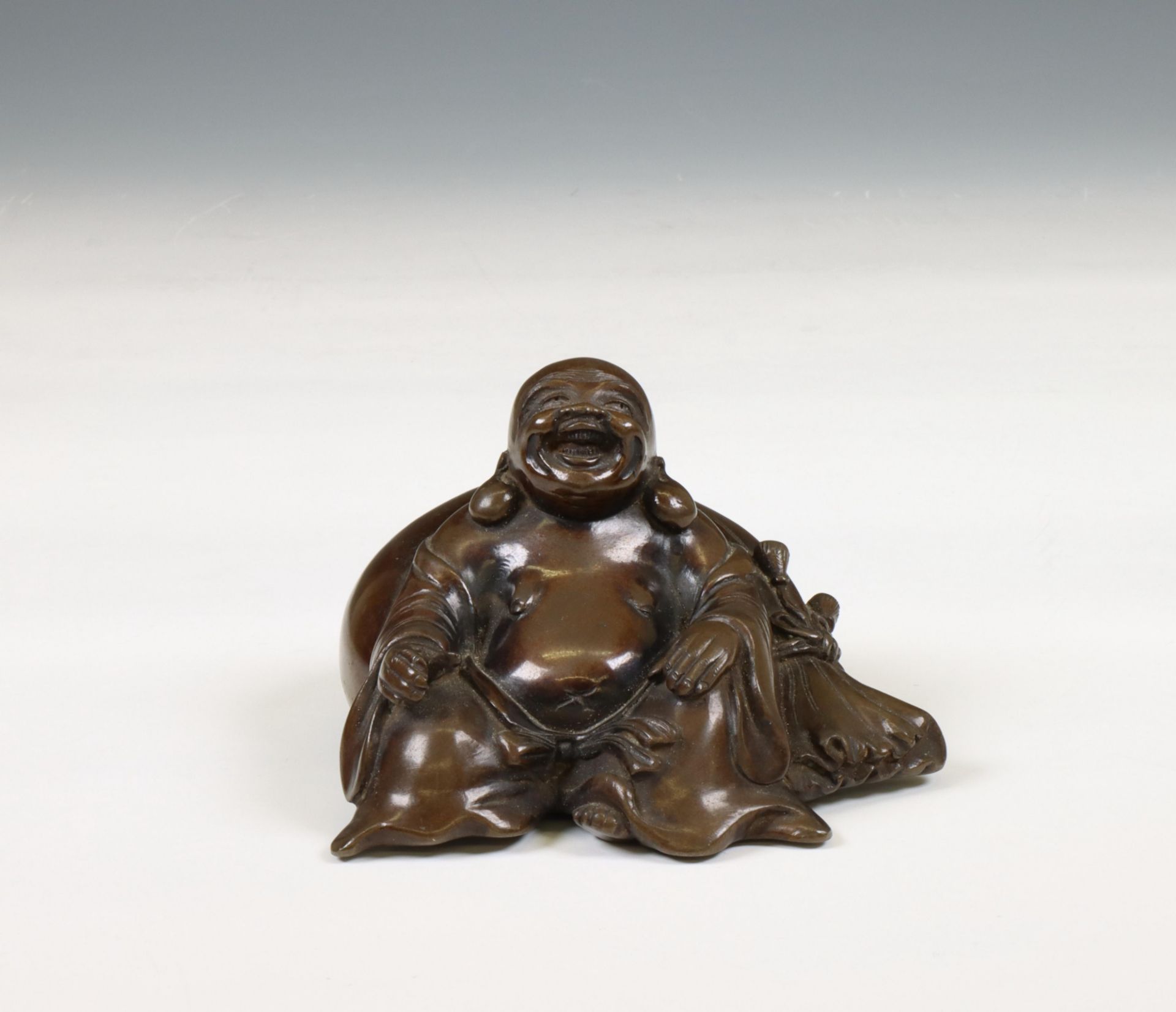 China, a bronze figure of Budai, 19th/ 20th century,