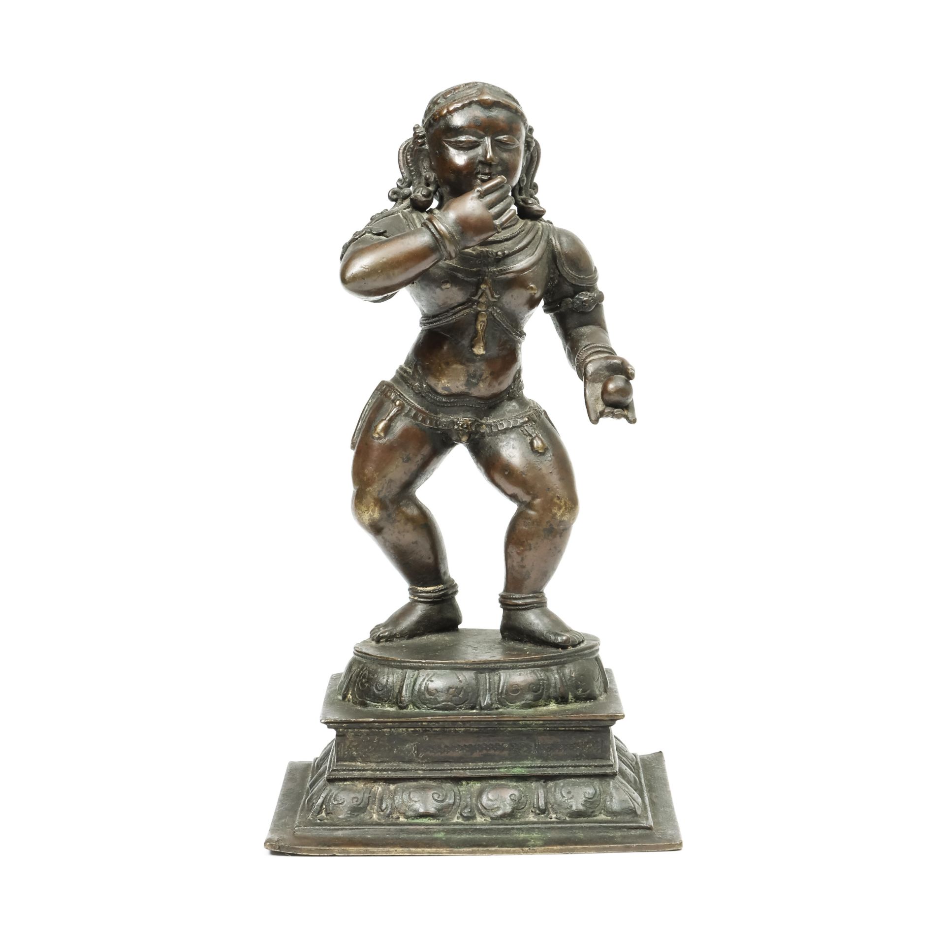 South India, a bronze figure of dancing Krishna, Navanita-nritta-krsna, 19th-20th century;