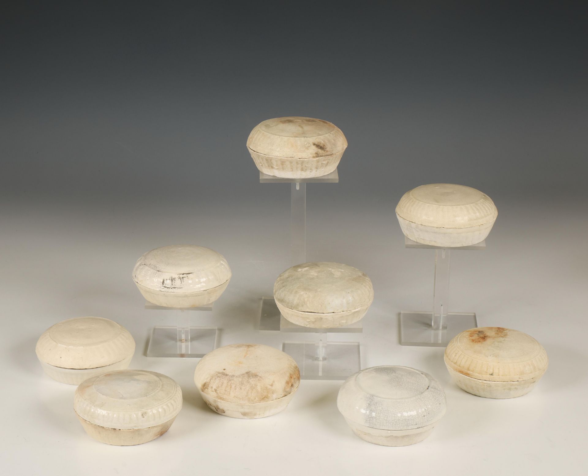 China, collection of nine white-glazed cosmetics boxes and covers, Northern Song dynasty, 10th-12th 