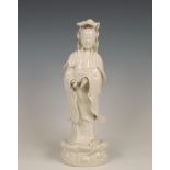 China, white-glazed porcelain figure of Guanyin, 20th century,