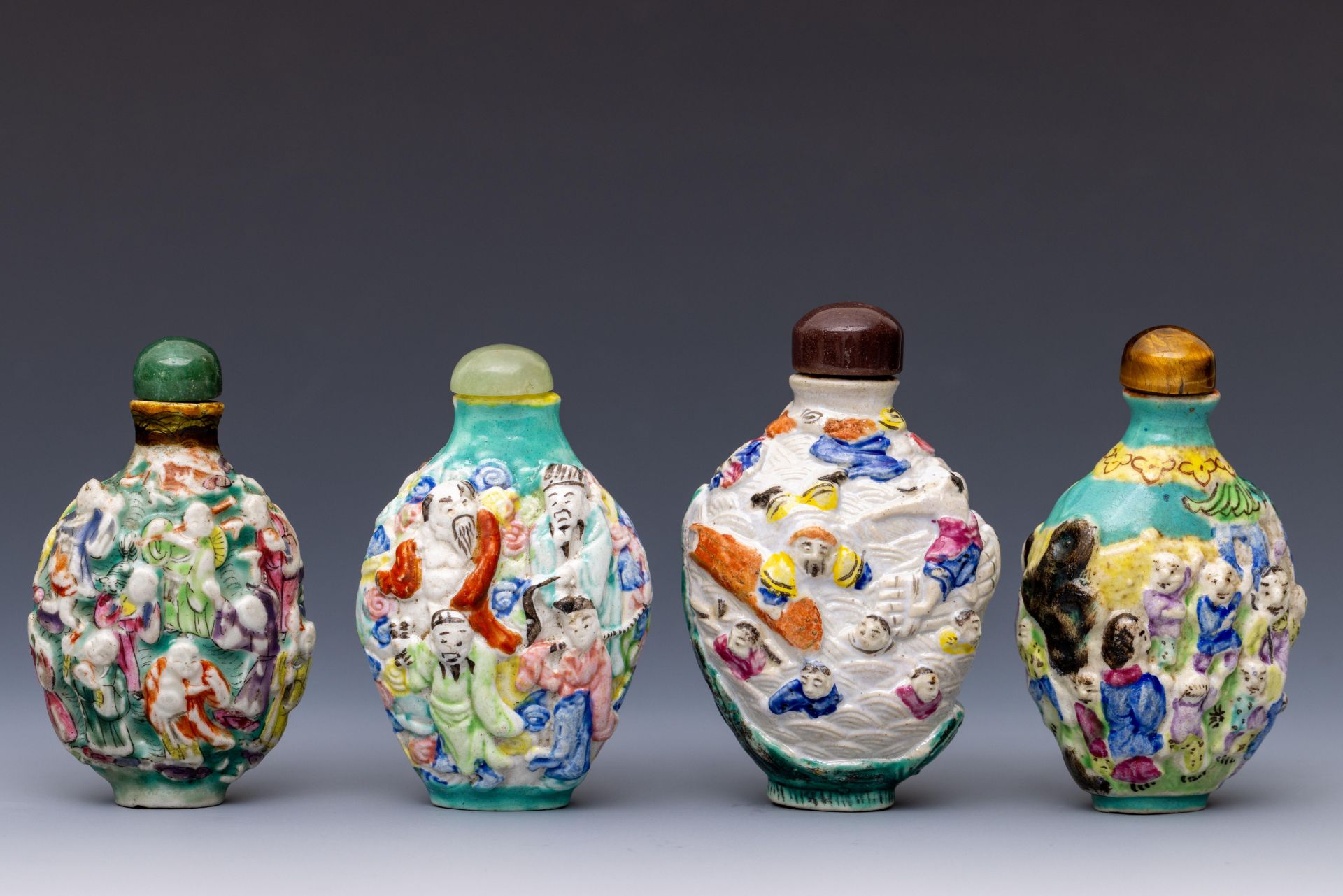 China, four moulded famille rose porcelain snuff bottles and stoppers, 19th century, - Image 2 of 3