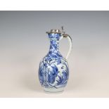 Japan, silver-mounted blue and white Arita porcelain jug, mid-17th century, the silver later,