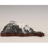 Japan, suiseki stone shaped as a snowy mountain,