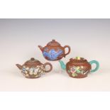 China, three famille rose and blue decorated Yixing teapots and covers, 20th century,