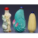 China, three moulded porcelain snuff bottles and stoppers, 19th/ 20th century,