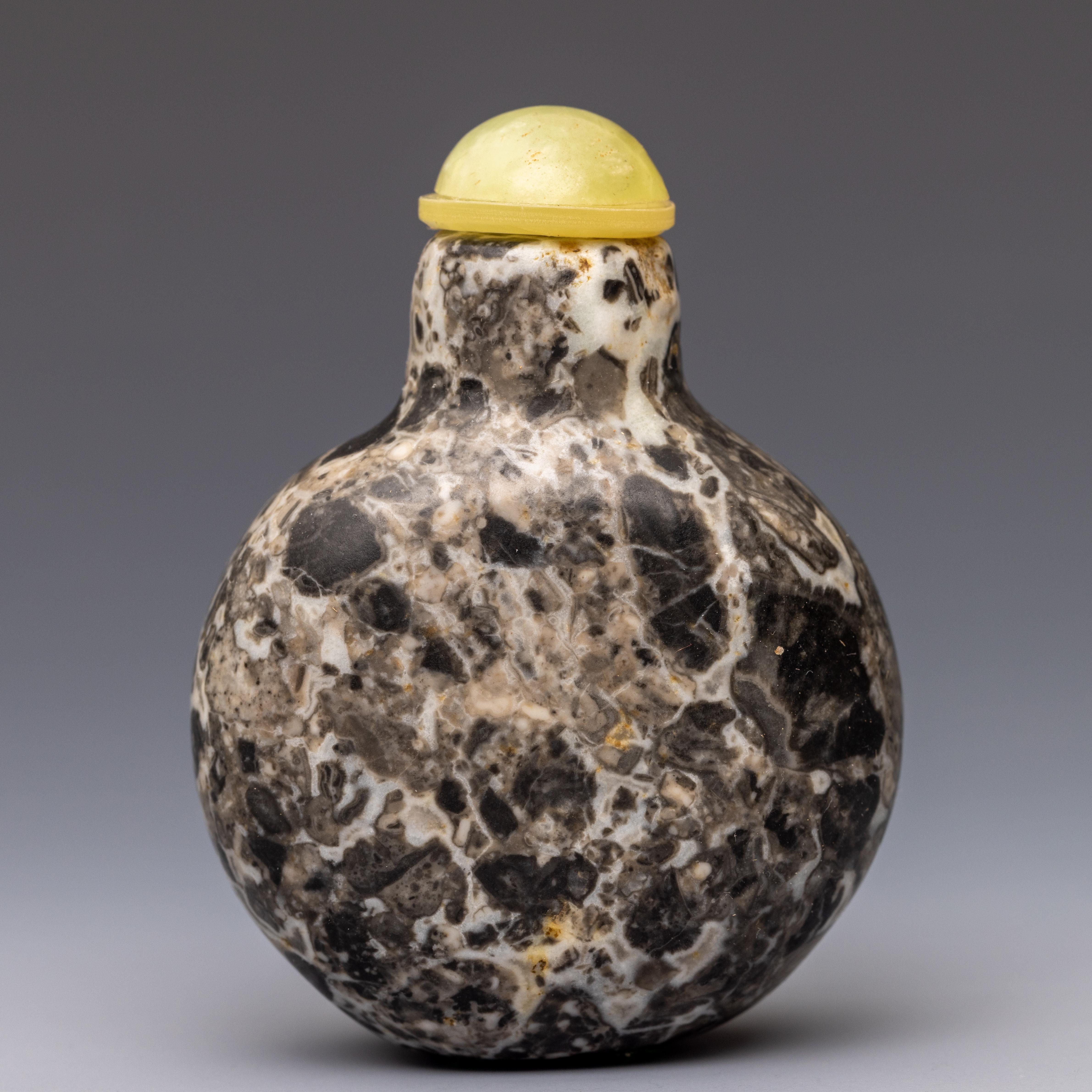 China, a mottled agate snuff bottle and stopper,
