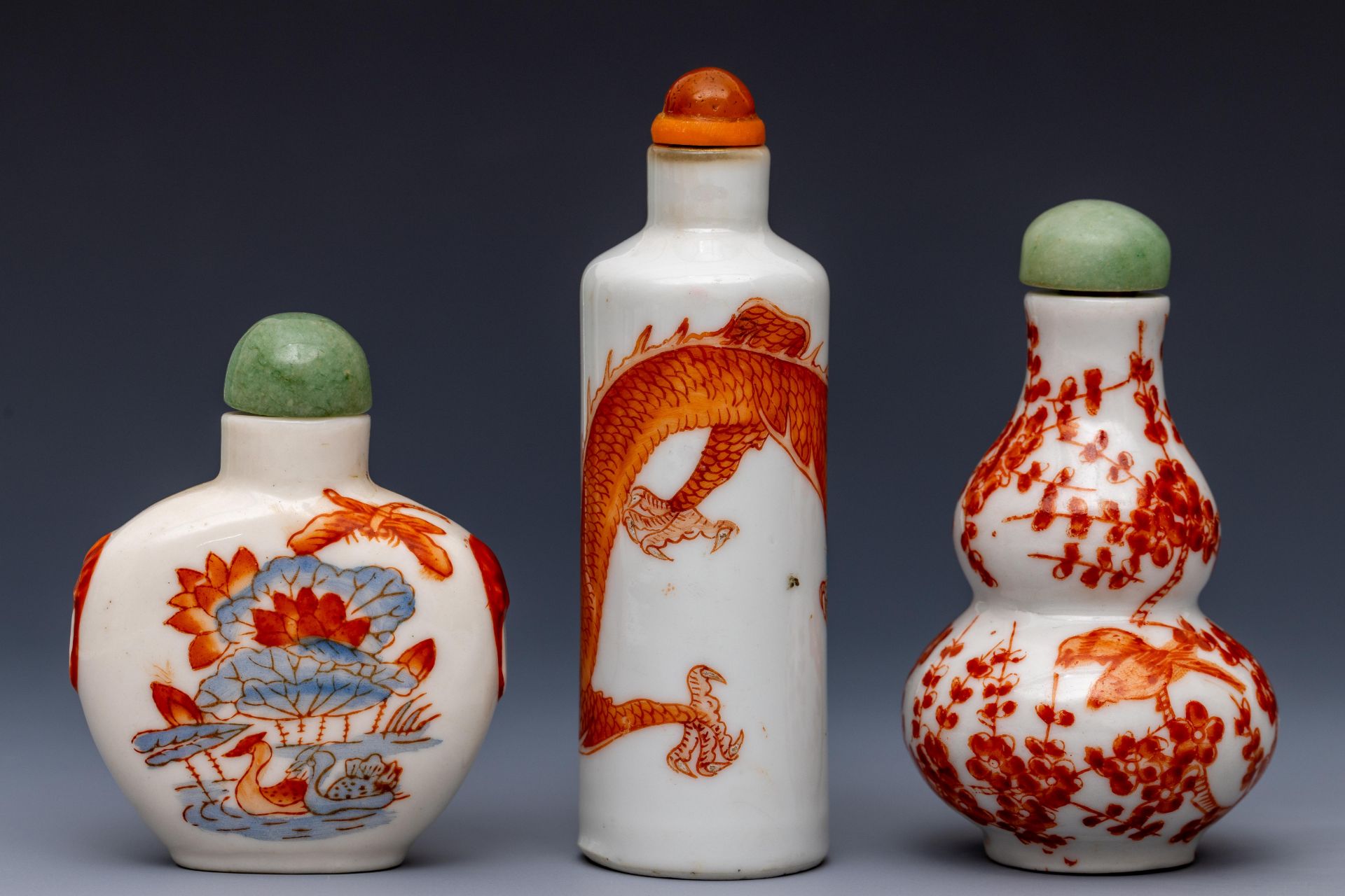 China, three iron-red decorated porcelain snuff bottles and stoppers, late 19th/ 20th century, - Image 2 of 3