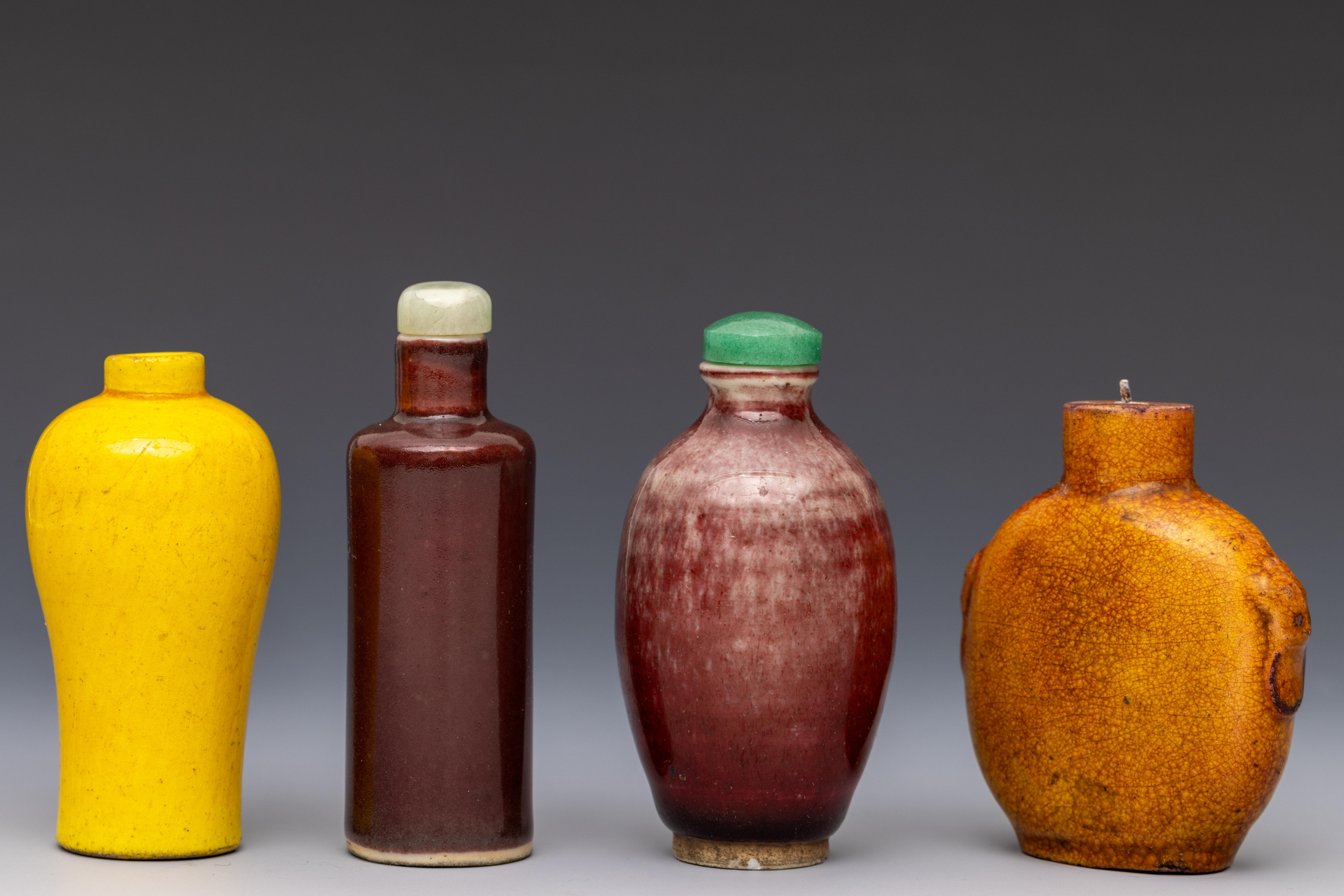 China, four red and yellow-glazed porcelain snuff bottles and two stoppers, 18th-19th century, - Image 2 of 3