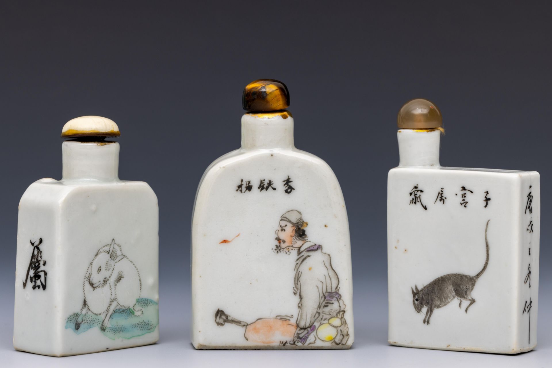 China, three polychrome decorated porcelain figural snuff bottles and stoppers, late Qing dynasty (1 - Image 2 of 2