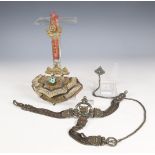 Tibet, a silver fire stone pouch and a silver alloy belt, ca. 1930;