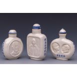 China, three Norman Bethune commemorative porcelain snuff bottles and stoppers, 20th century,