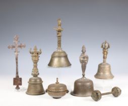 India, four temple bells, a rattle and a pigment container, ca. 1900 or later.