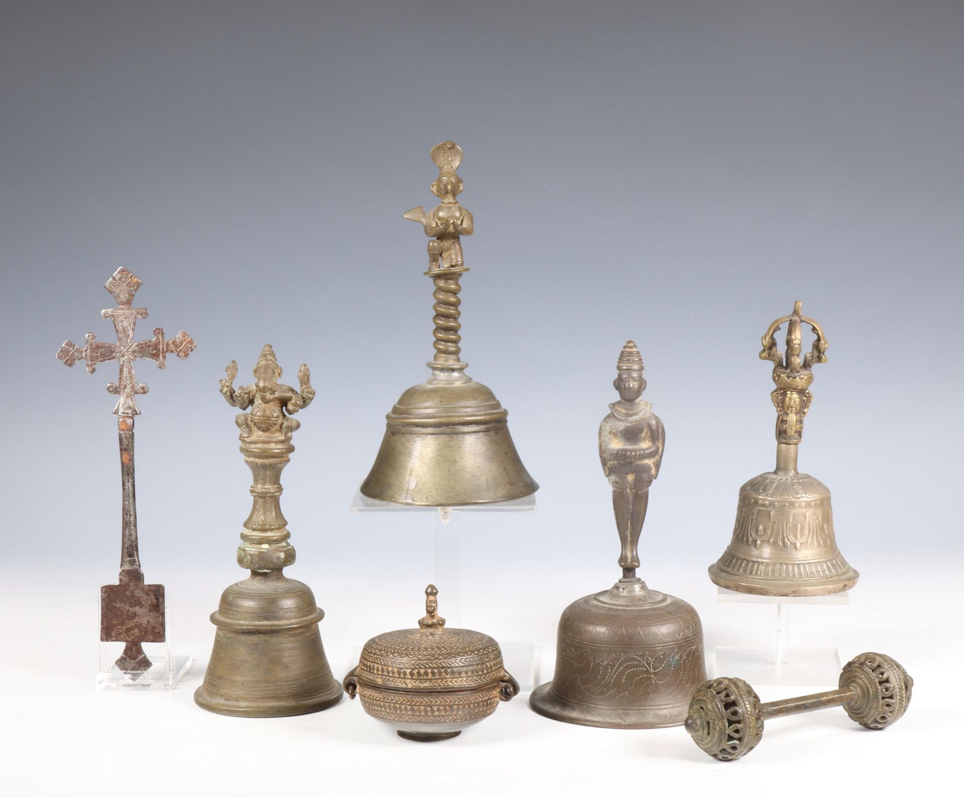 India, four temple bells, a rattle and a pigment container, ca. 1900 or later.