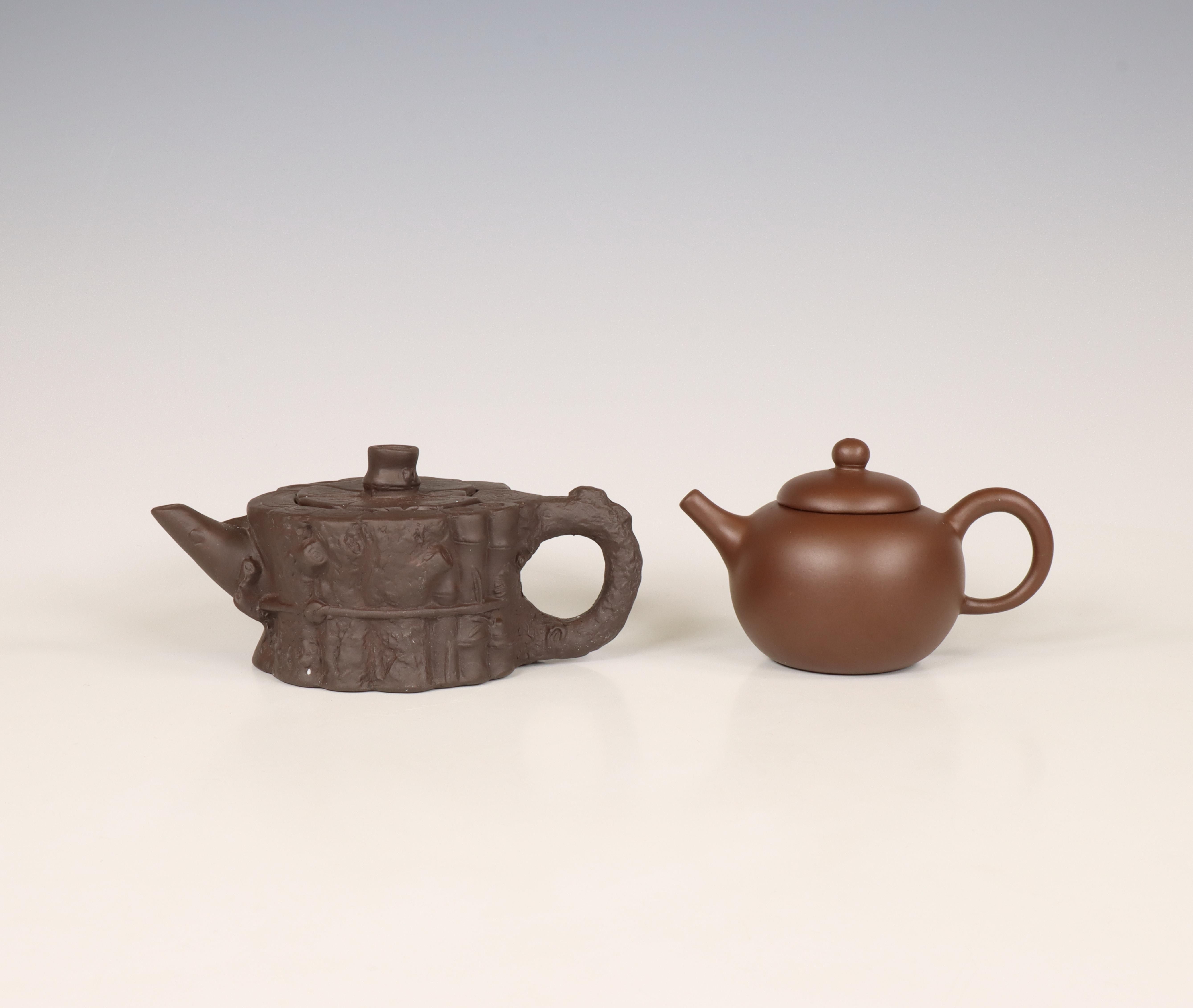 China, two Yixing earthenware teapots and covers, modern,