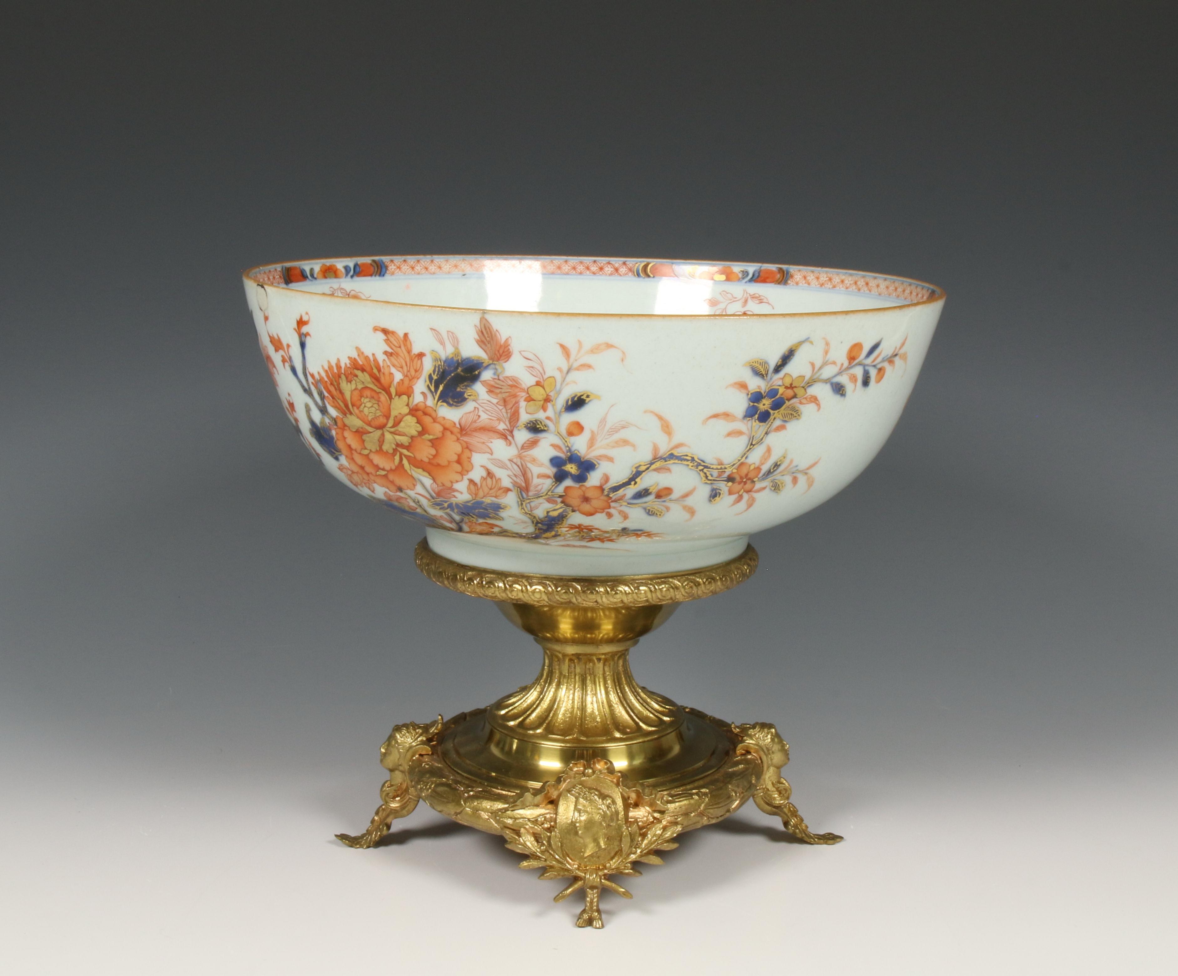 China, Imari porcelain bowl on gilt stand, 18th century, the stand later,