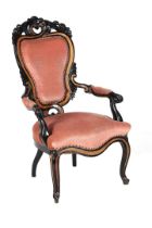 Mahogany veneer covered armchair