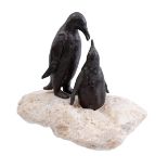 Sculpture of 2 penguins