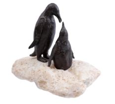 Sculpture of 2 penguins