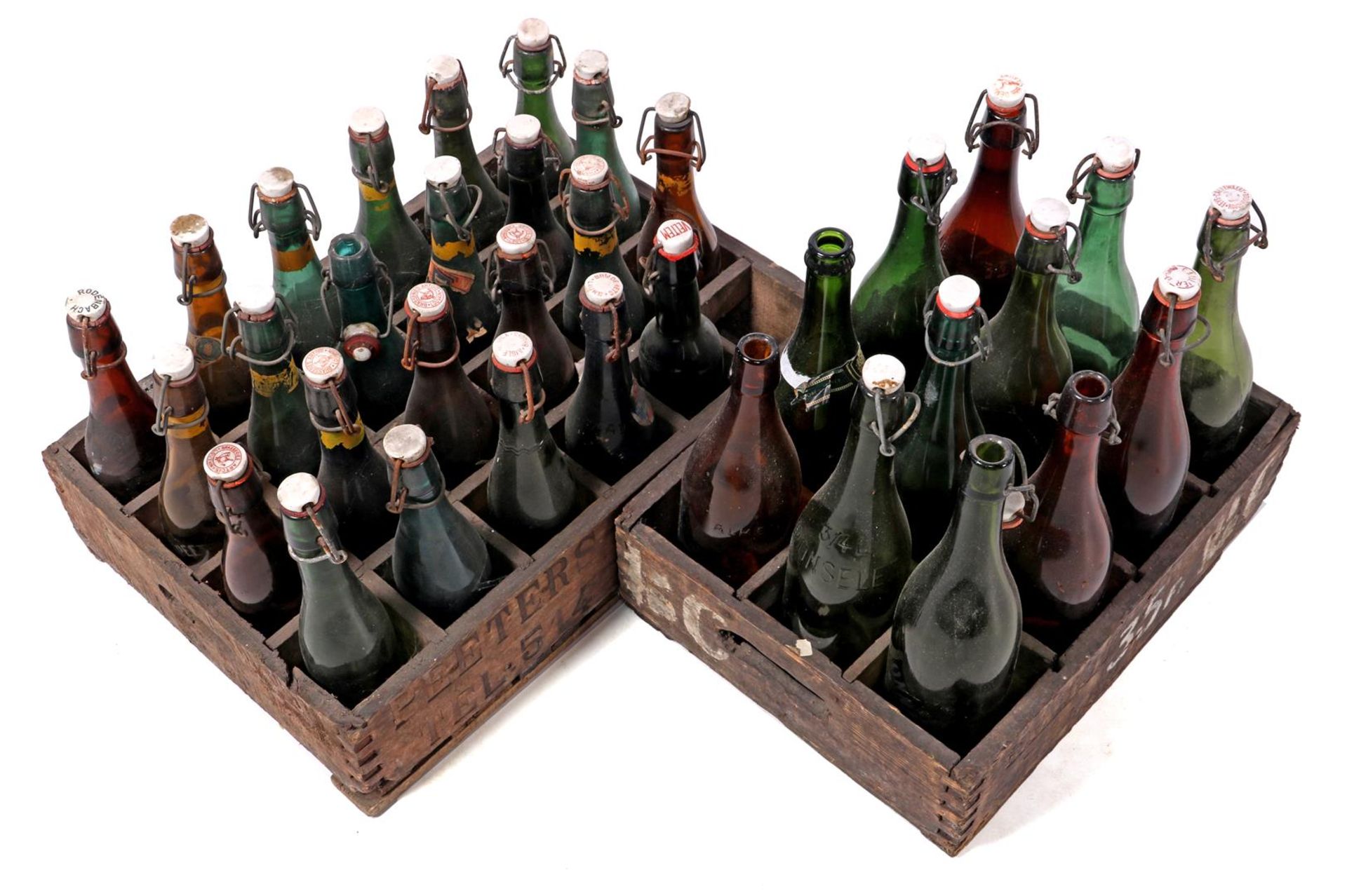 2 crates with green beer bottles