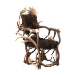 Armchair made of antlers and fur