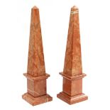 2 marble obelisks