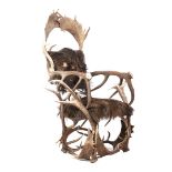 Armchair made of antlers and fur