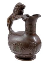 Bronze jug with lion on top