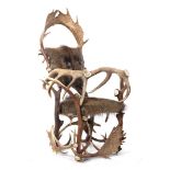 Armchair made of antlers and fur