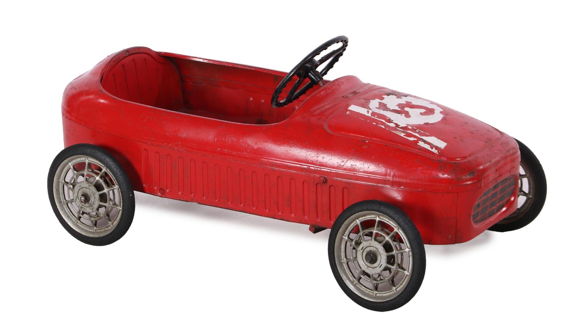 Red pedal car
