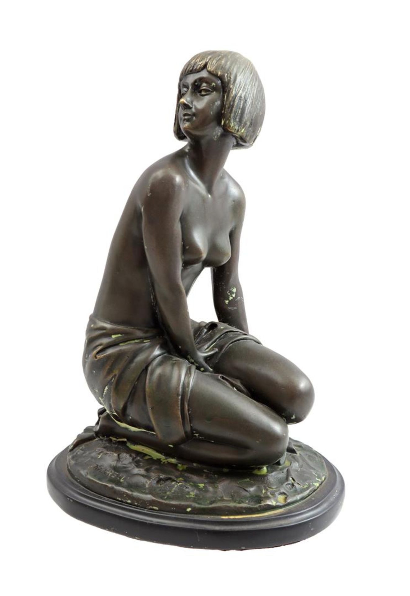 Bronze statue of a posing nude