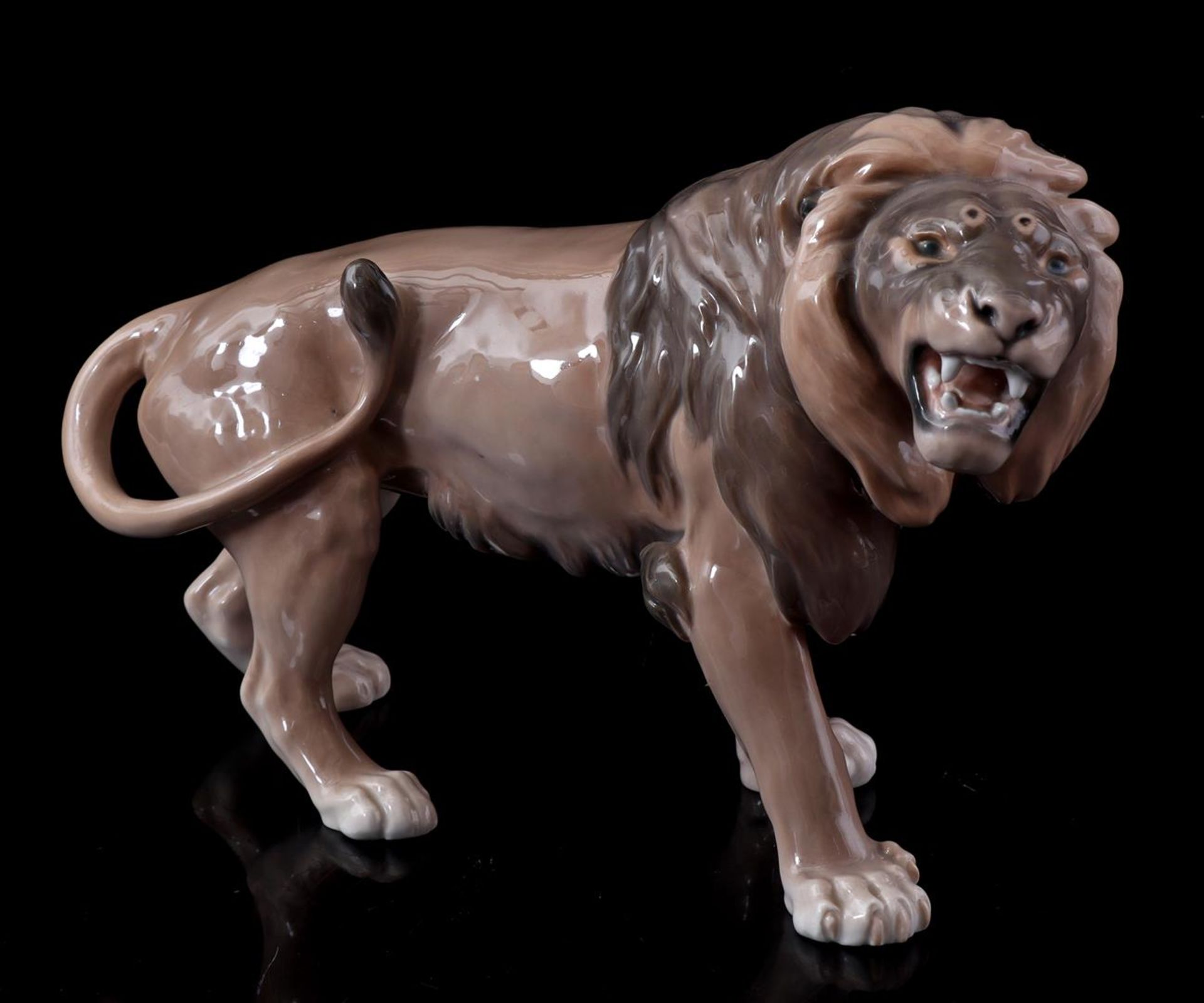 Porcelain statue of a lion