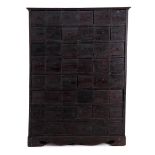 48-drawer black stained oak shelving unit