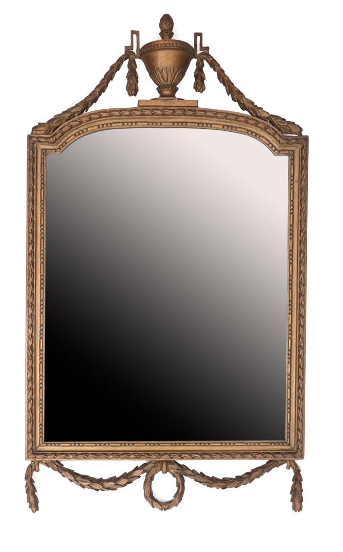 Facet cut mirror in richly decorated gold-colored frame